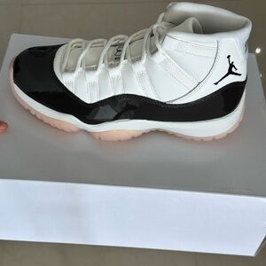 Jordan 11 Retro Sneakers in White and Black